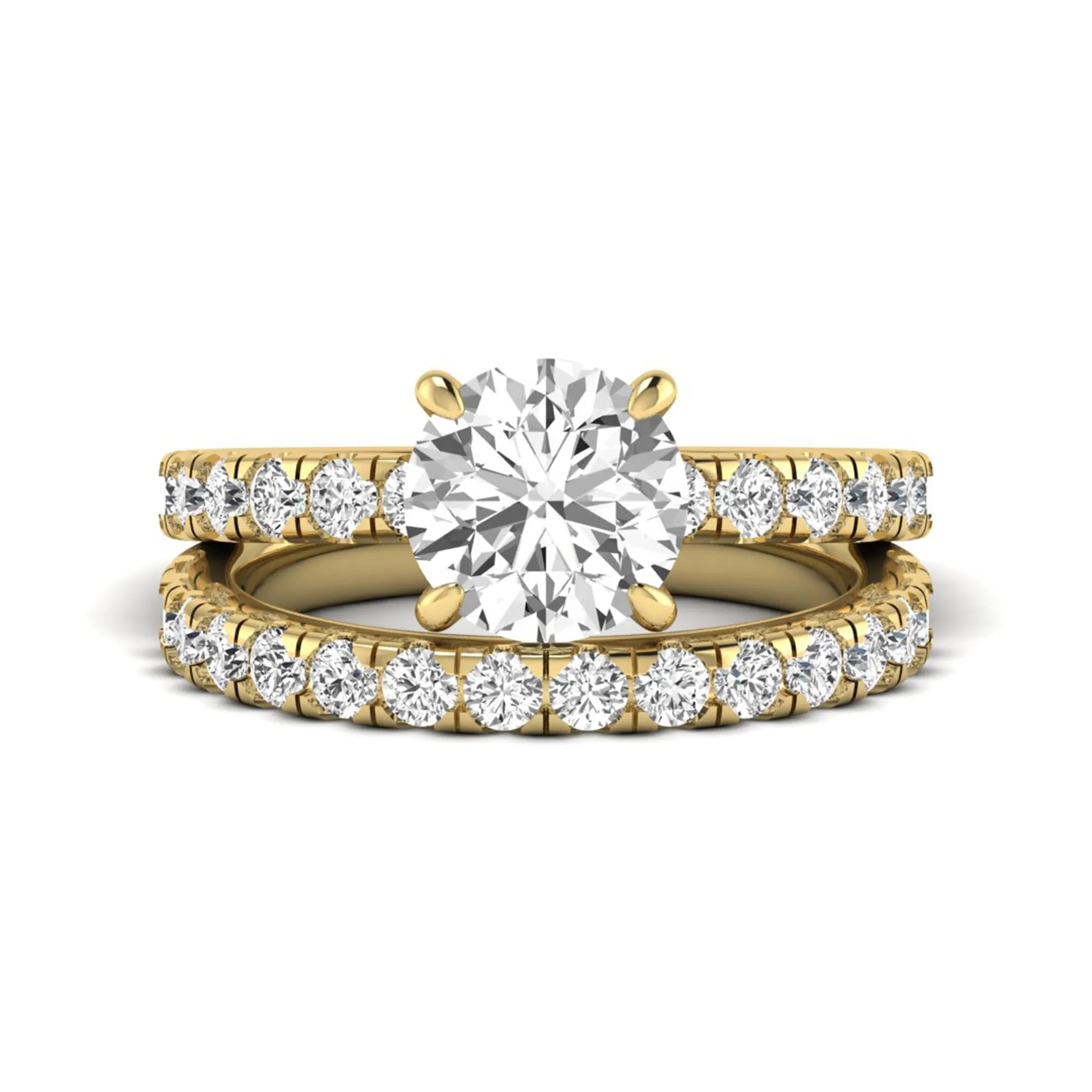 Round cut lab grown diamond bridal ring set in yellow gold featuring a 1.67 carat IGI certified center diamond with matching diamond wedding band.