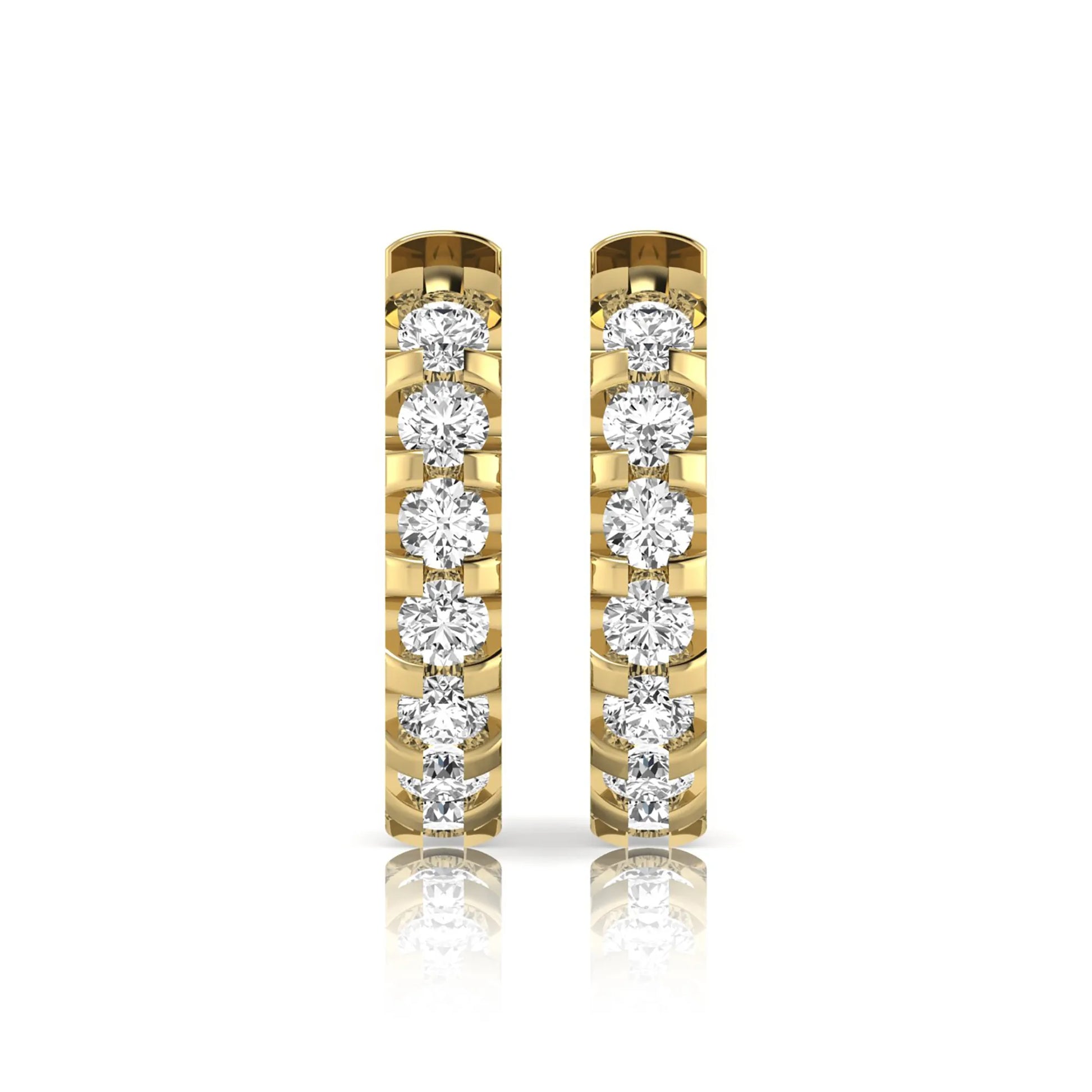 Round lab grown diamond half eternity huggie hoop earrings featuring a continuous row of round brilliant diamonds in a shared prong setting in yellow gold