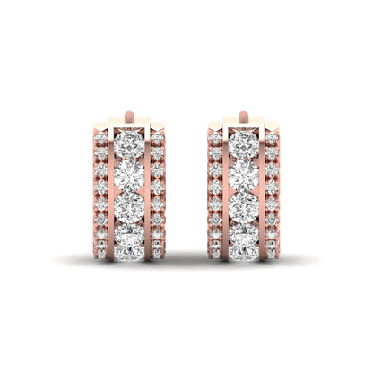 Round cut lab grown diamond multi-row huggie hoop earrings featuring a center row of diamonds with side accent diamonds and a hinged snap closure in a rose gold tone.