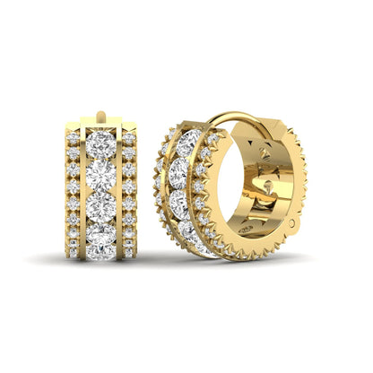 Round cut lab grown diamond multi-row huggie hoop earrings featuring a center row of diamonds with side accent diamonds and a hinged snap closure in a yellow gold tone.