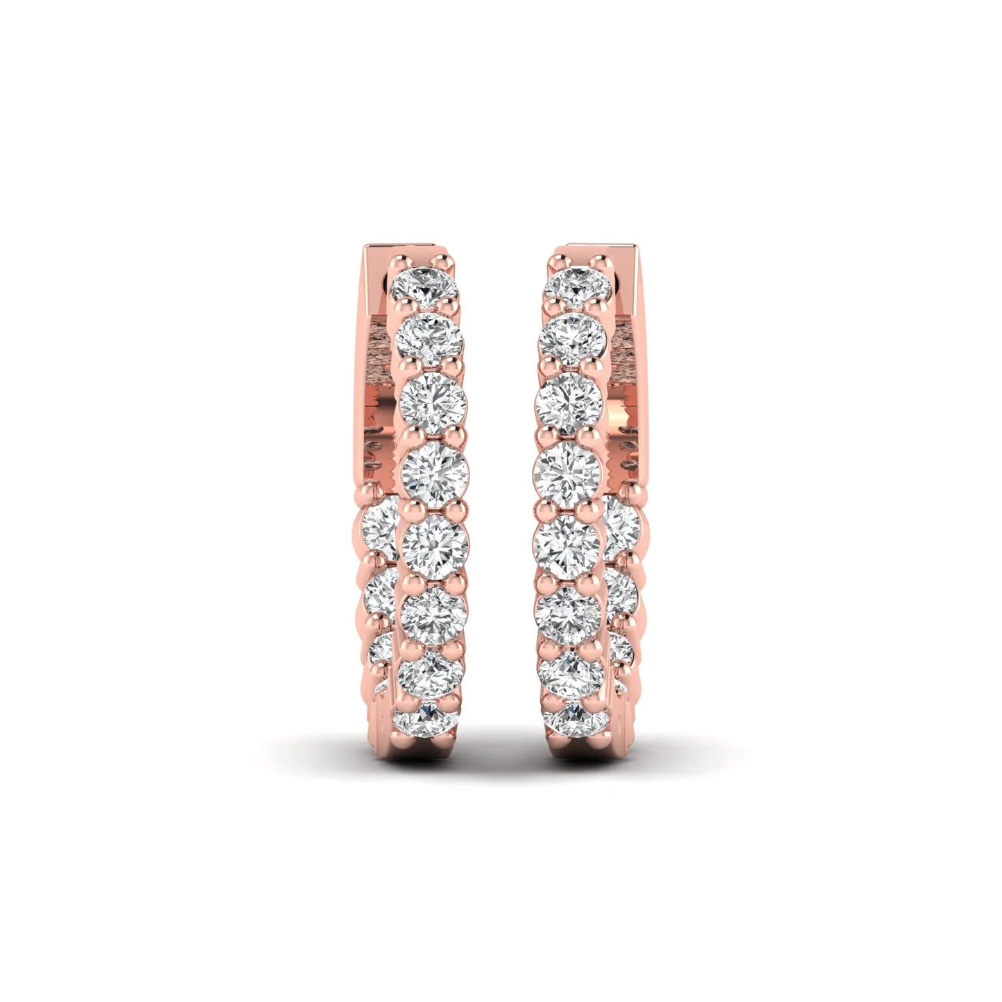 rose gold Round cut lab grown diamond huggie hoop earrings with prong setting and hinged hoop closure