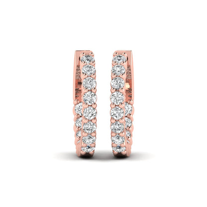 rose gold Round cut lab grown diamond huggie hoop earrings with prong setting and hinged hoop closure