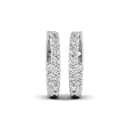 white gold Round cut lab grown diamond huggie hoop earrings with prong setting and hinged hoop closure