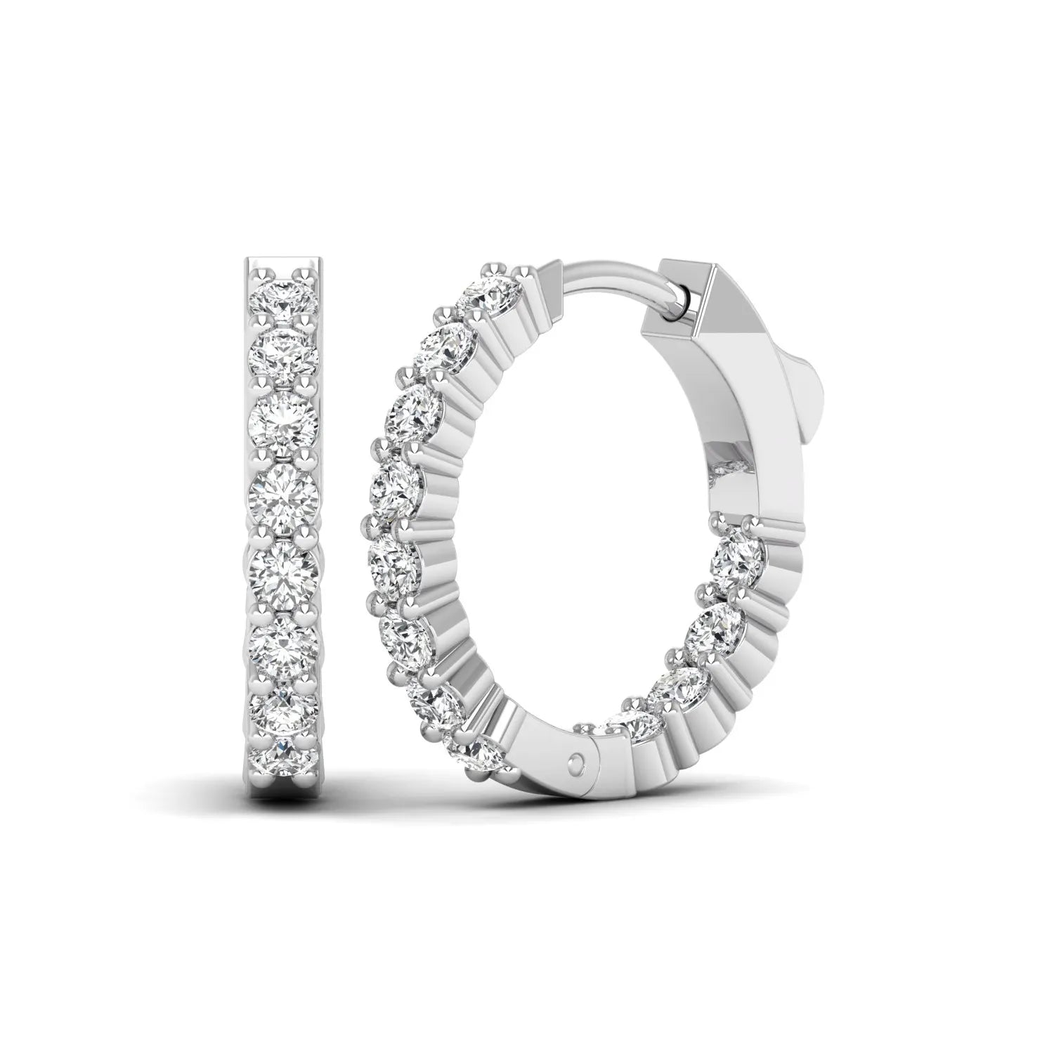 white gold Round cut lab grown diamond huggie hoop earrings with prong setting and hinged hoop closure