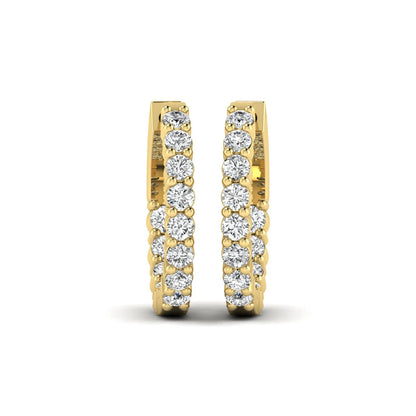 yellow gold Round cut lab grown diamond huggie hoop earrings with prong setting and hinged hoop closure