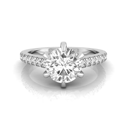 Round cut lab grown diamond pavé engagement ring featuring a 1.28 carat IGI certified center diamond with round diamond accented band in white gold.