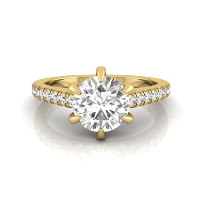Round cut lab grown diamond pavé engagement ring featuring a 1.28 carat IGI certified center diamond with round diamond accented band in yellow gold.