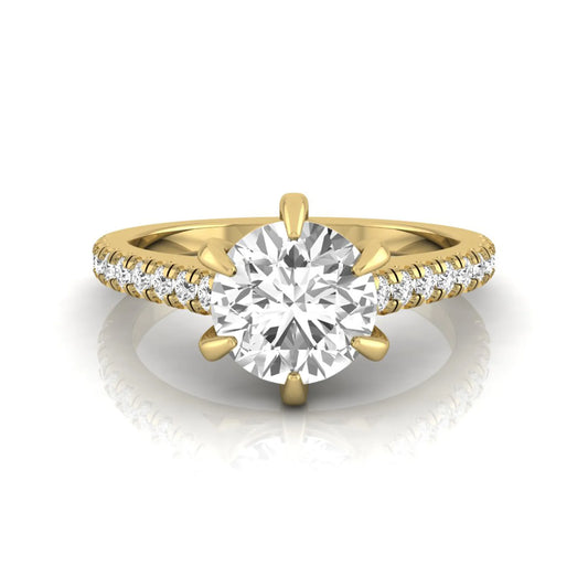 Round cut lab grown diamond pavé engagement ring featuring a 1.28 carat IGI certified center diamond with round diamond accented band in yellow gold.