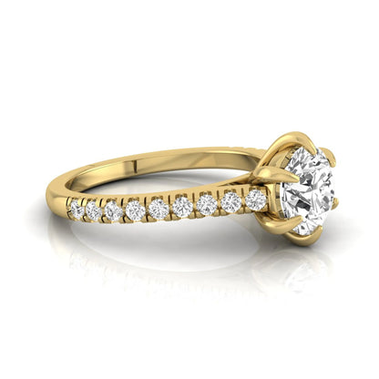Round cut lab grown diamond pavé engagement ring featuring a 1.28 carat IGI certified center diamond with round diamond accented band in yellow gold.