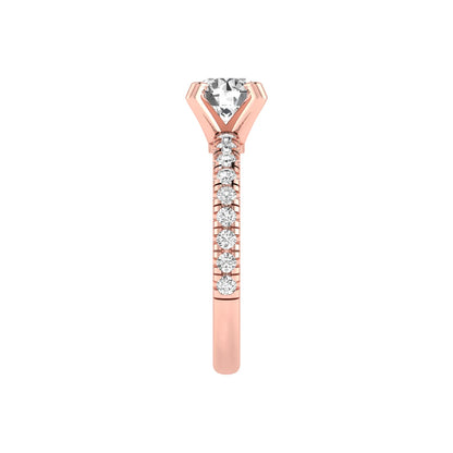 Round lab grown diamond pavé solitaire engagement ring featuring a 1.00 carat IGI certified round brilliant diamond with pavé diamond band in rose gold.