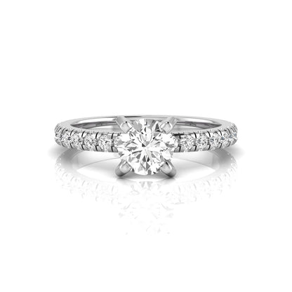 Round lab grown diamond pavé solitaire engagement ring featuring a 1.00 carat IGI certified round brilliant diamond with pavé diamond band in white gold.