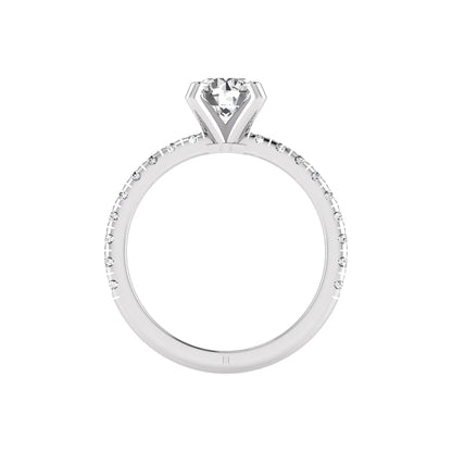 Round lab grown diamond pavé solitaire engagement ring featuring a 1.00 carat IGI certified round brilliant diamond with pavé diamond band in white gold.