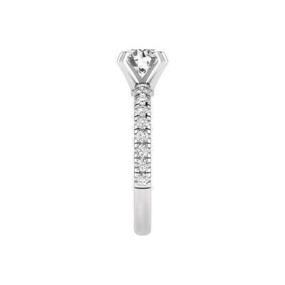 Round lab grown diamond pavé solitaire engagement ring featuring a 1.00 carat IGI certified round brilliant diamond with pavé diamond band in white gold.