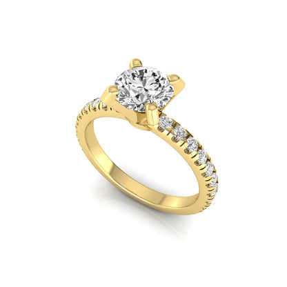 Round lab grown diamond pavé solitaire engagement ring featuring a 1.00 carat IGI certified round brilliant diamond with pavé diamond band in yellow gold.
