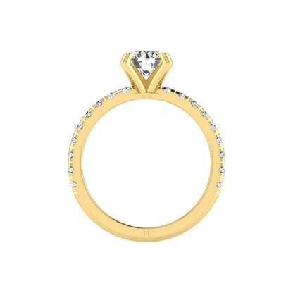 Round lab grown diamond pavé solitaire engagement ring featuring a 1.00 carat IGI certified round brilliant diamond with pavé diamond band in yellow gold.