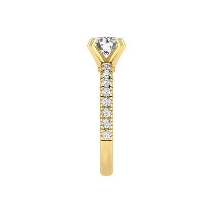 Round lab grown diamond pavé solitaire engagement ring featuring a 1.00 carat IGI certified round brilliant diamond with pavé diamond band in yellow gold.