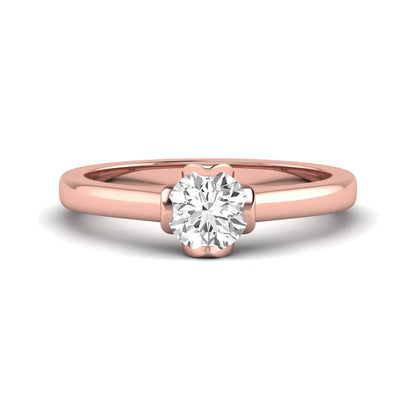 Round cut lab grown diamond solitaire engagement ring in rose gold featuring a 1.03 carat IGI certified center diamond.