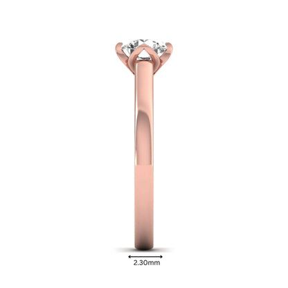 Round cut lab grown diamond solitaire engagement ring in rose gold featuring a 1.03 carat IGI certified center diamond.
