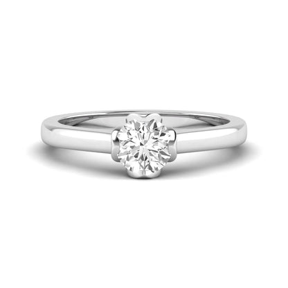 Round cut lab grown diamond solitaire engagement ring in white gold featuring a 1.03 carat IGI certified center diamond.