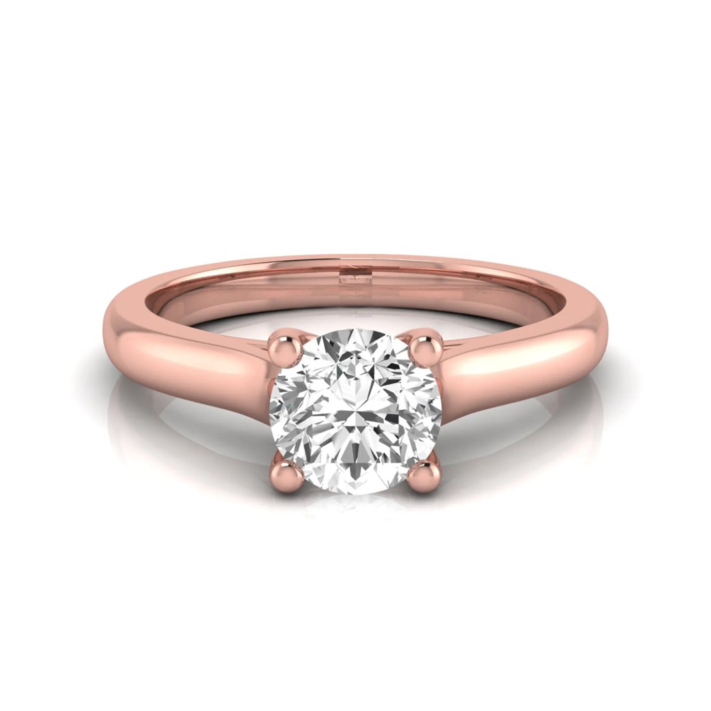 Round lab grown diamond solitaire engagement ring featuring a 0.65 carat round brilliant diamond in a classic four-prong rose gold setting.