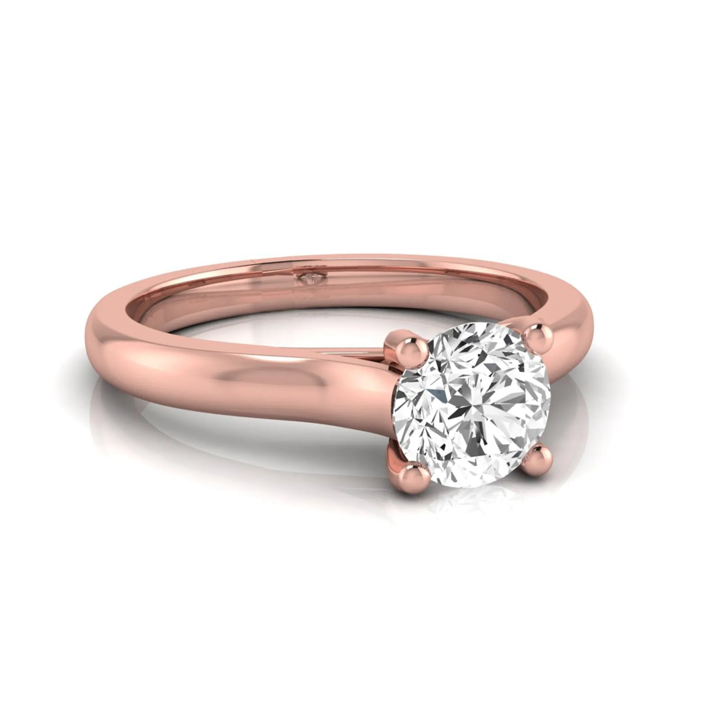Round lab grown diamond solitaire engagement ring featuring a 0.65 carat round brilliant diamond in a classic four-prong rose gold setting.
