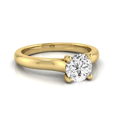 Round lab grown diamond solitaire engagement ring featuring a 0.65 carat round brilliant diamond in a classic four-prong yellow gold setting.