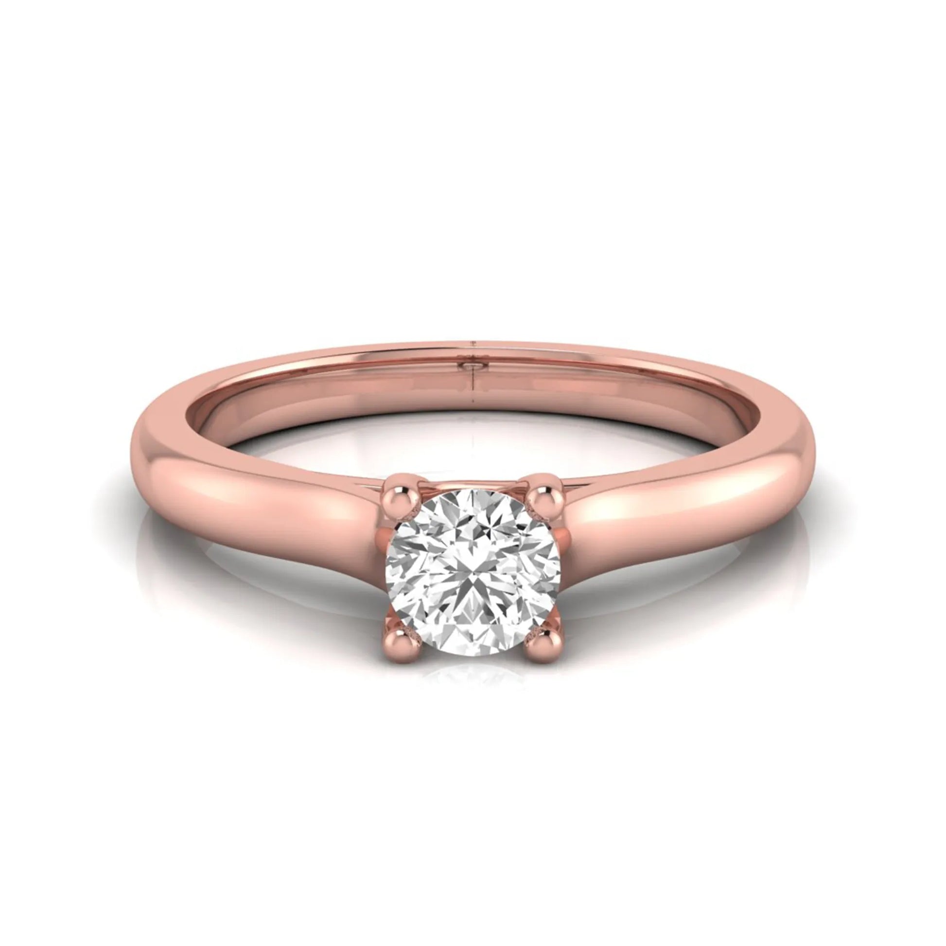 Round lab grown diamond solitaire engagement ring featuring a 0.29 carat round brilliant diamond in a classic four-prong rose gold setting.