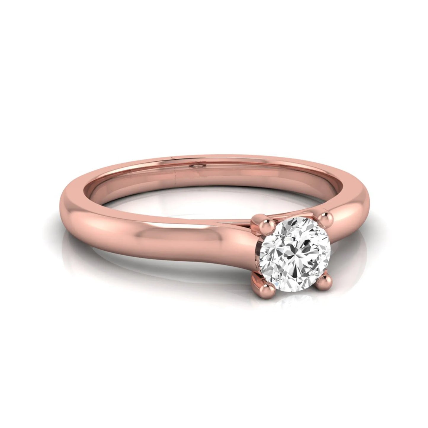 Round lab grown diamond solitaire engagement ring featuring a 0.29 carat round brilliant diamond in a classic four-prong rose gold setting.