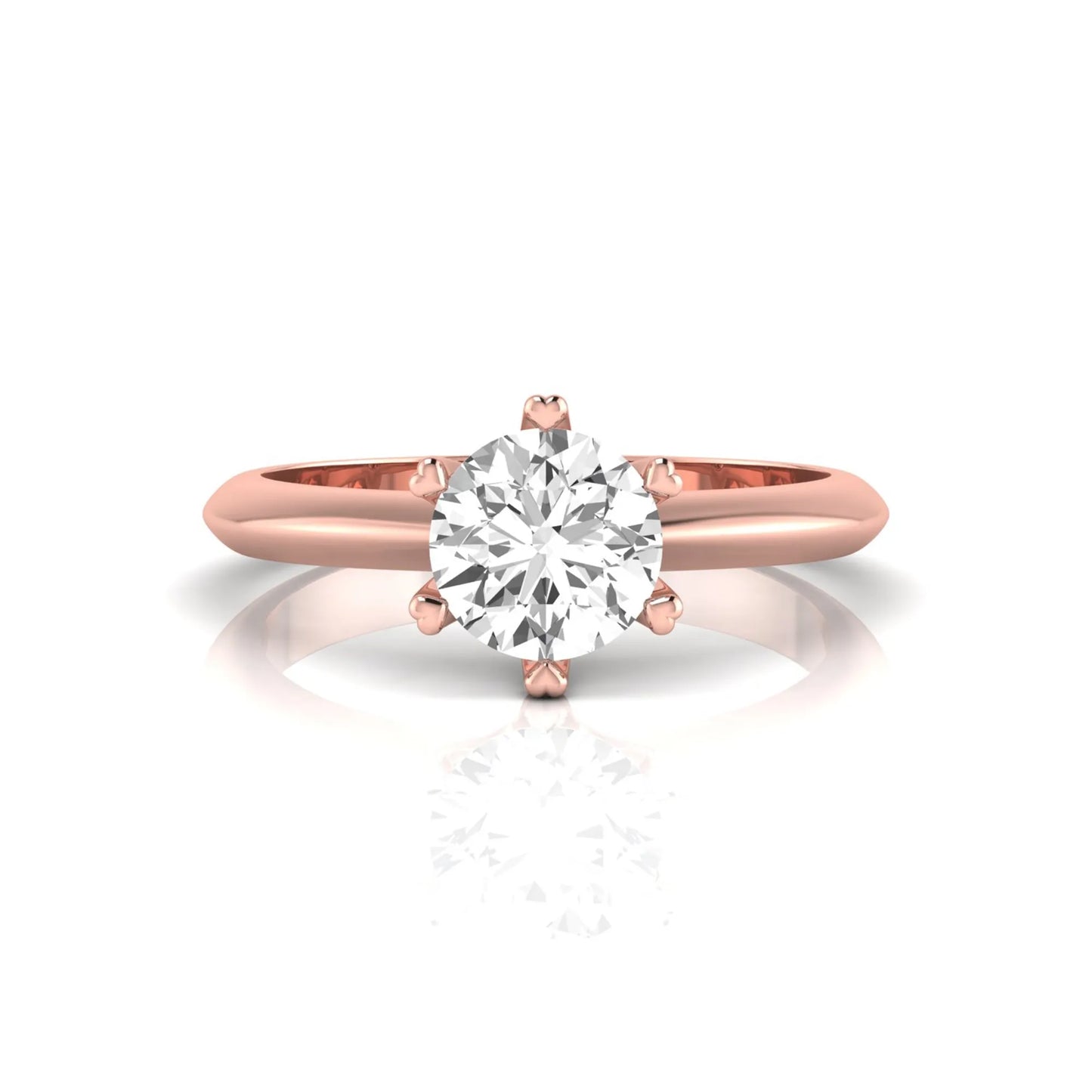 Rose-gold ring with a diamond on a white background
