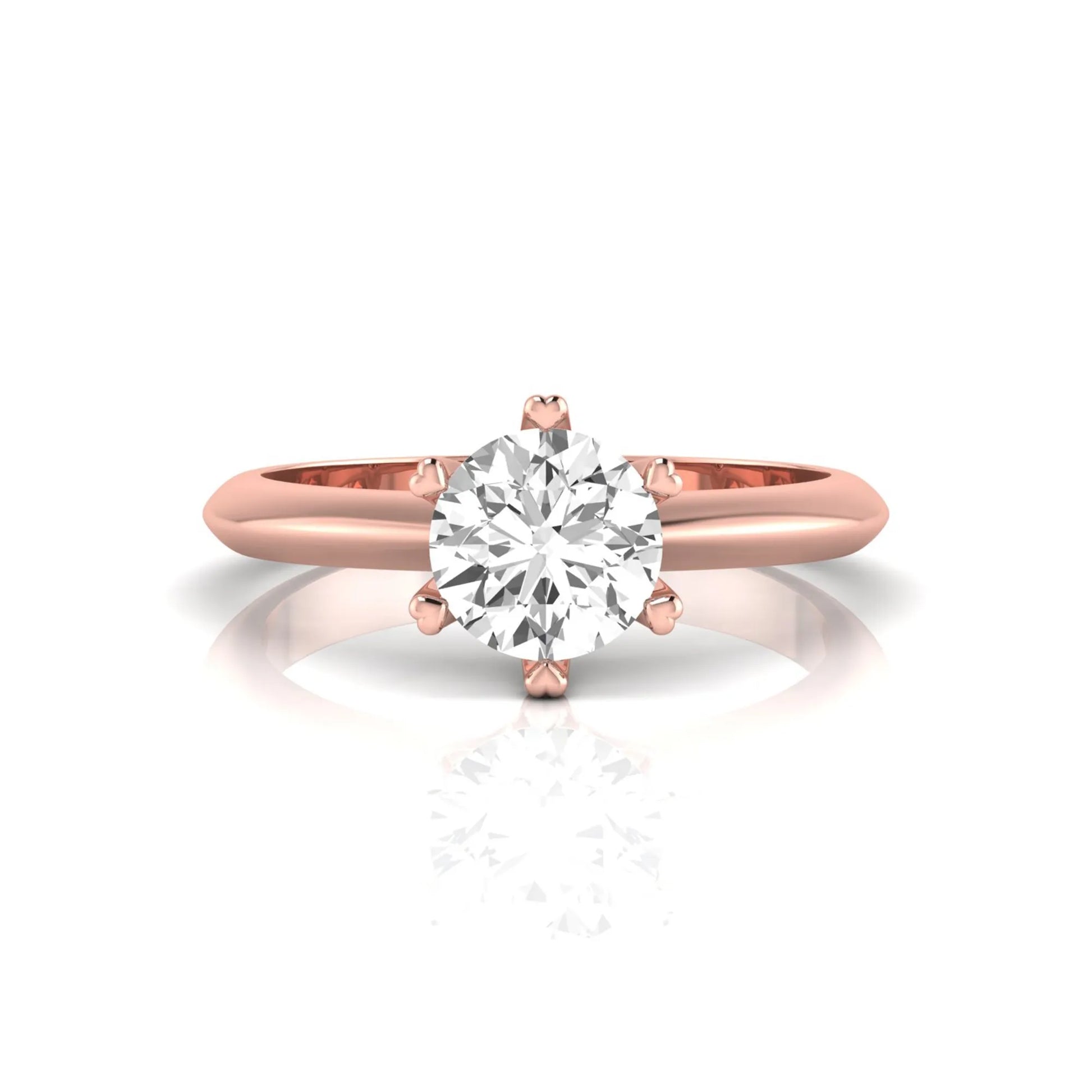 Rose-gold ring with a diamond on a white background