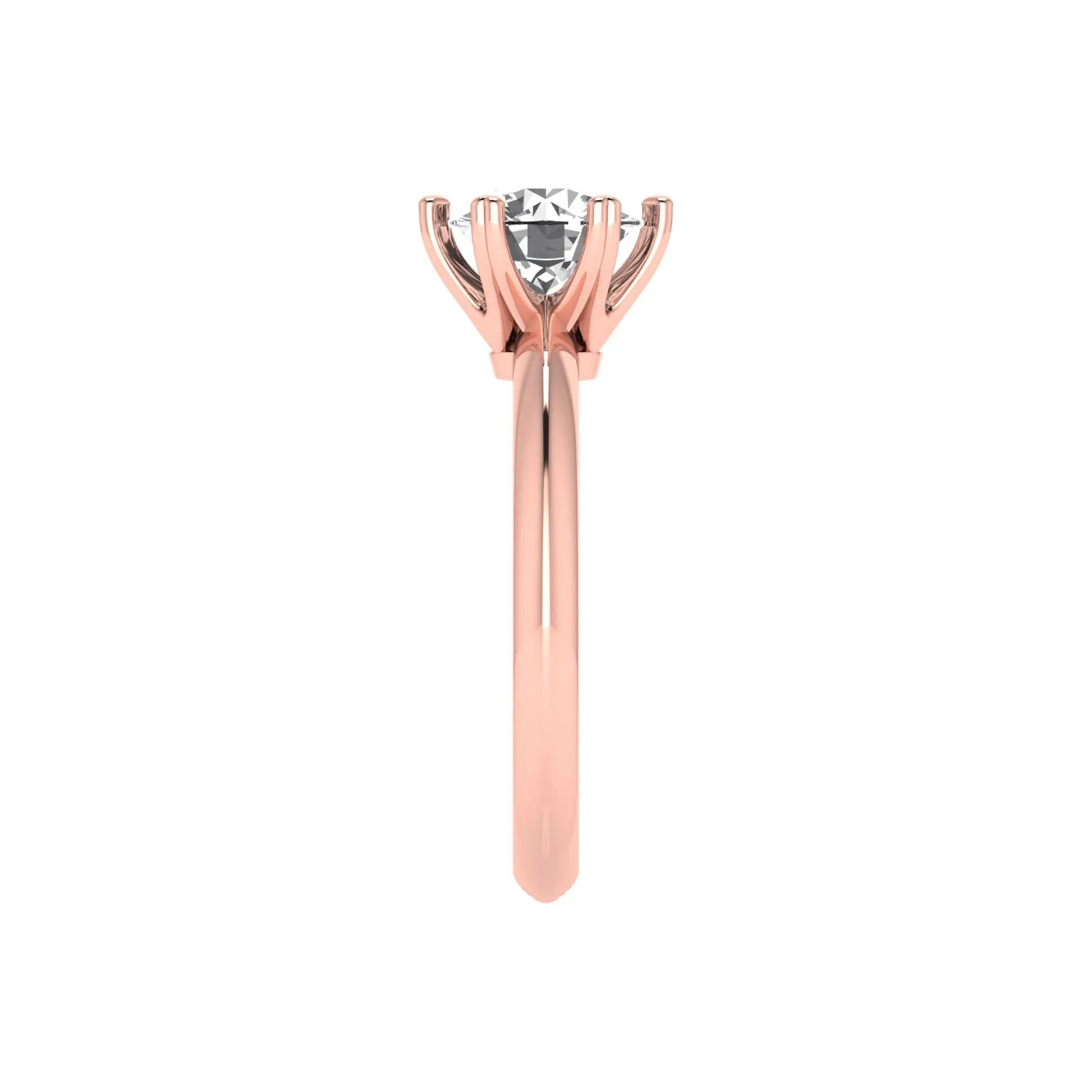 Rose-gold ring with a diamond on a white background
