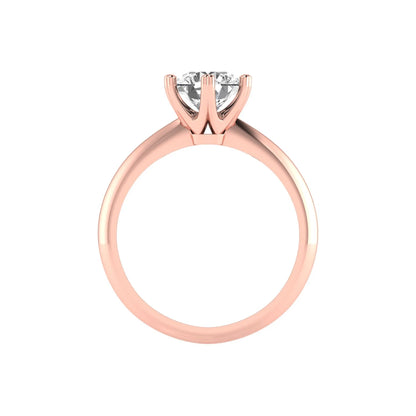Rose-gold ring with a diamond on a white background