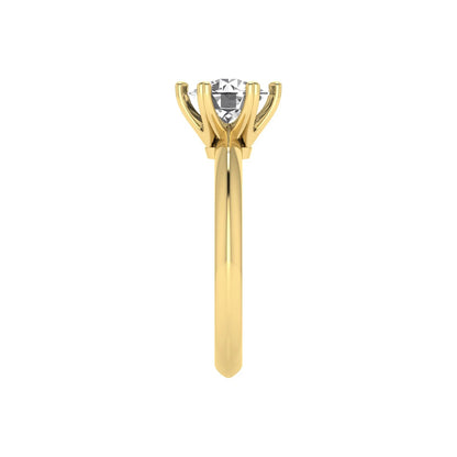 yellow-Gold ring with a diamond on a white background