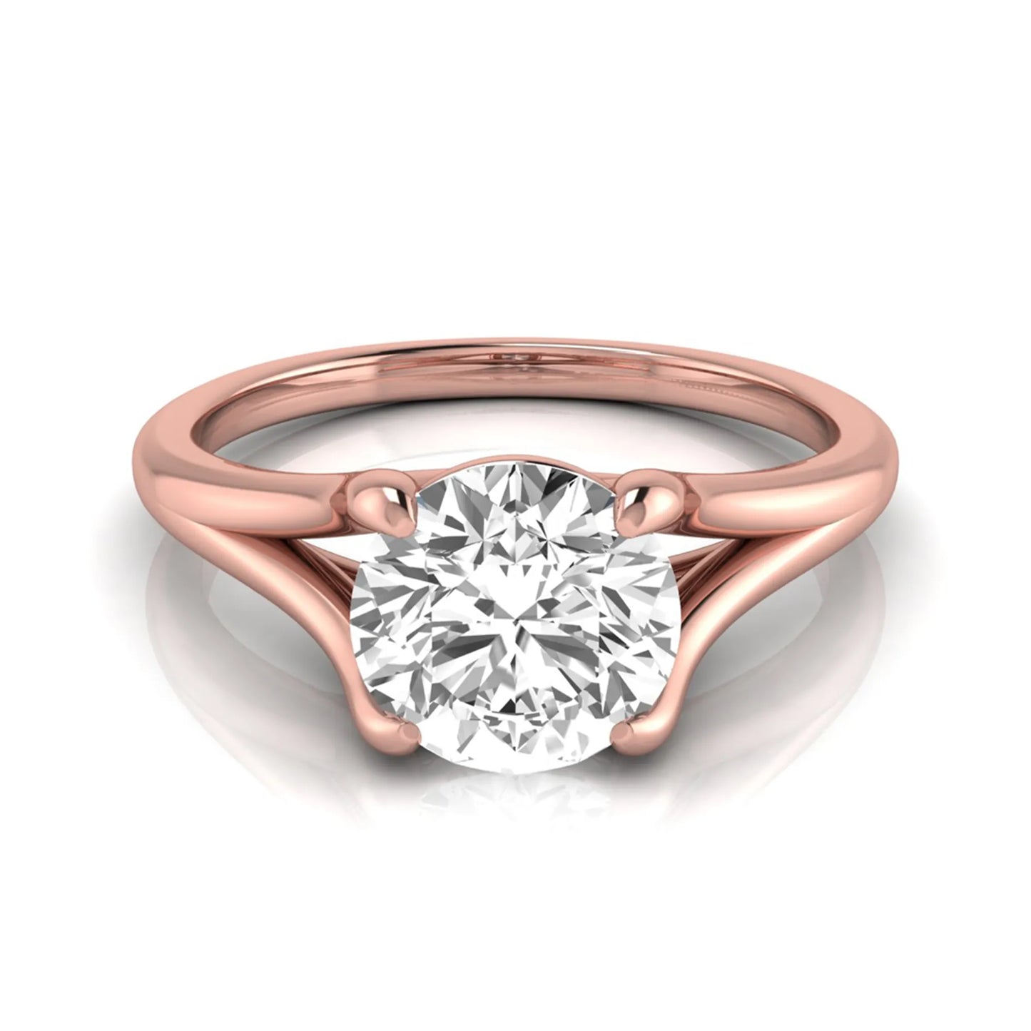 Round cut lab grown diamond split shank solitaire engagement ring featuring a 1.55 carat IGI certified center diamond in rose gold.