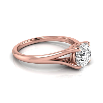 Round cut lab grown diamond split shank solitaire engagement ring featuring a 1.55 carat IGI certified center diamond in rose gold.