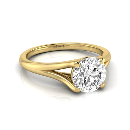 Round cut lab grown diamond split shank solitaire engagement ring featuring a 1.55 carat IGI certified center diamond in yellow gold.