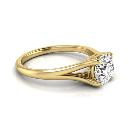 Round cut lab grown diamond split shank solitaire engagement ring featuring a 1.55 carat IGI certified center diamond in yellow gold.