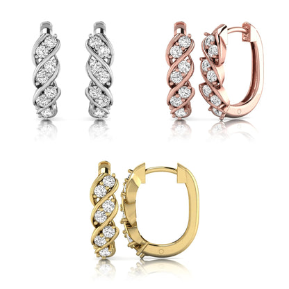 Set of gold, silver, and rose gold hoop earrings with diamond accents on a white background