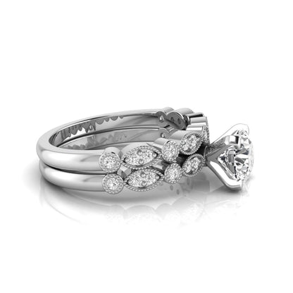 Round milgrain vintage lab grown diamond bridal ring set featuring a 1.28 carat IGI certified round center diamond with matching vintage-inspired diamond wedding band in a white gold design.