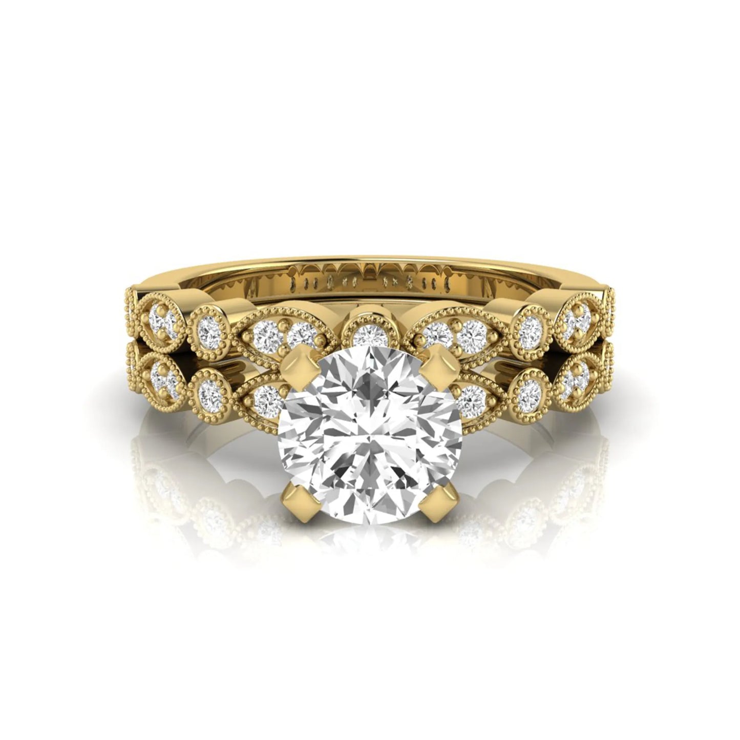 Round milgrain vintage lab grown diamond bridal ring set featuring a 1.28 carat IGI certified round center diamond with matching vintage-inspired diamond wedding band in a yellow gold design.