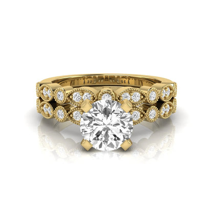 Round milgrain vintage lab grown diamond bridal ring set featuring a 1.28 carat IGI certified round center diamond with matching vintage-inspired diamond wedding band in a yellow gold design.