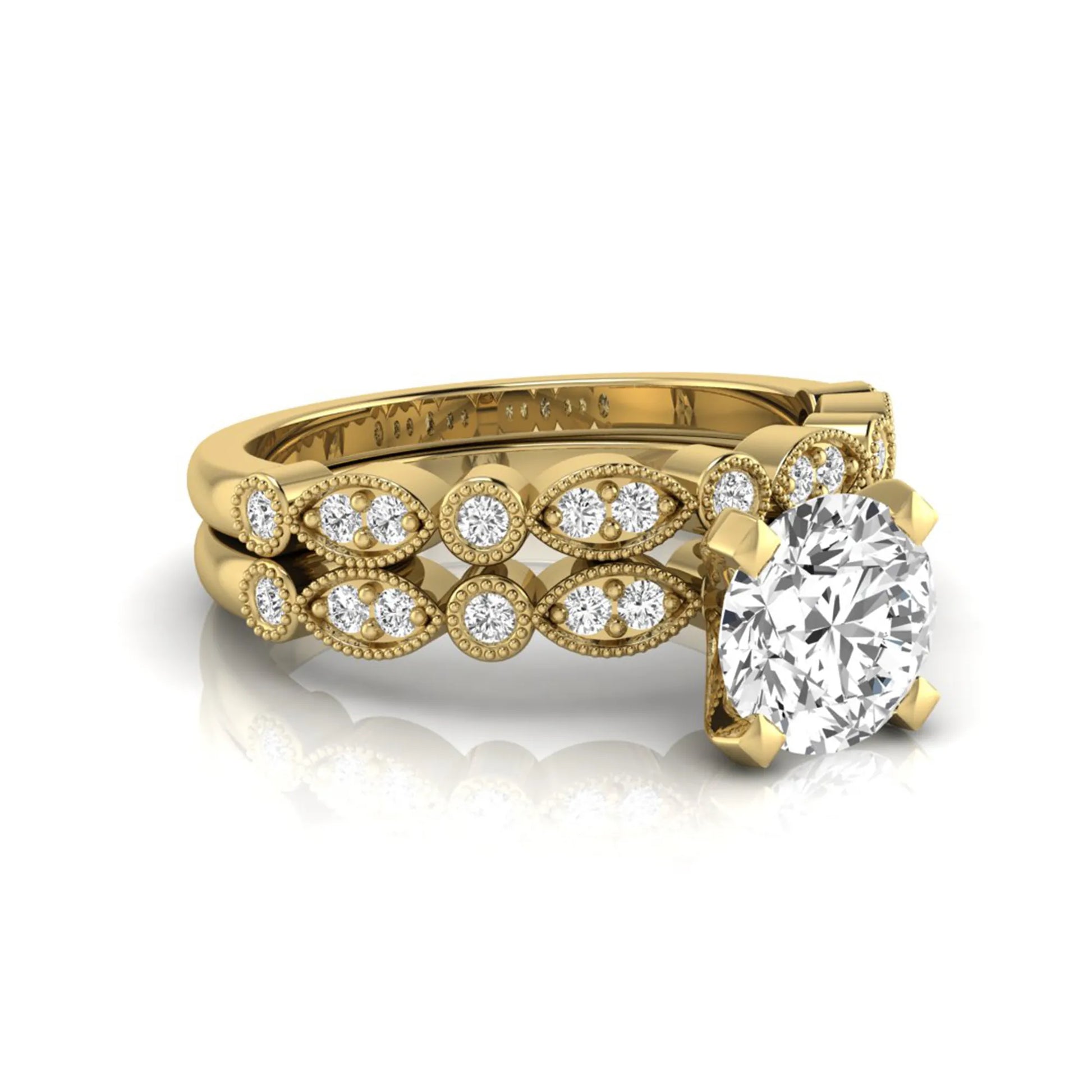 Round milgrain vintage lab grown diamond bridal ring set featuring a 1.28 carat IGI certified round center diamond with matching vintage-inspired diamond wedding band in a yellow gold design.