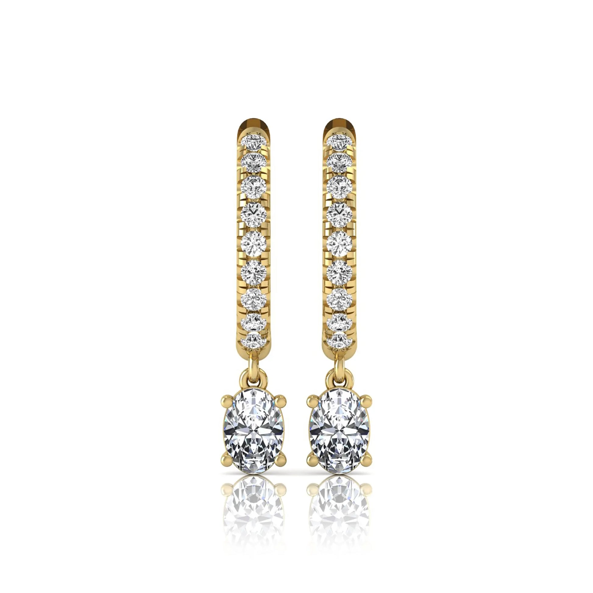 Round and oval cut lab grown diamond pavé drop huggie hoop earrings featuring sparkling round diamonds on the hoop, an oval diamond drop, hinged snap closure, and polished yellow gold tone finish.