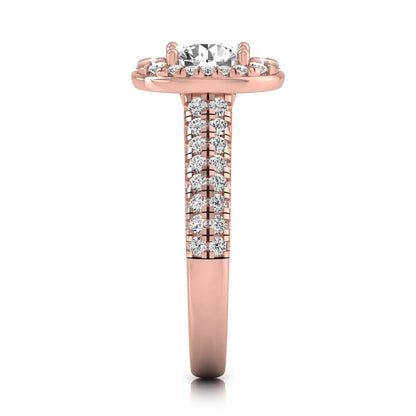 Round cut lab grown diamond engagement ring with an oval-shaped halo, double pavé side stones, and a rose gold style band.