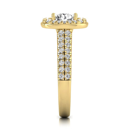 Round cut lab grown diamond engagement ring with an oval-shaped halo, double pavé side stones, and a yellow gold style band.