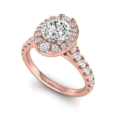 Round cut lab grown diamond engagement ring with an oval-shaped halo of round diamonds, pavé side stones, and a rose gold style band.