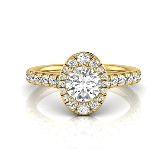 Round cut lab grown diamond engagement ring with an oval-shaped halo of round diamonds, pavé side stones, and a yellow gold style band.