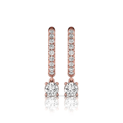 Round cut lab grown diamond pavé drop huggie hoop earrings featuring a brilliant round solitaire diamond, sparkling pavé diamonds, hinged snap closure, and polished rose gold finish.