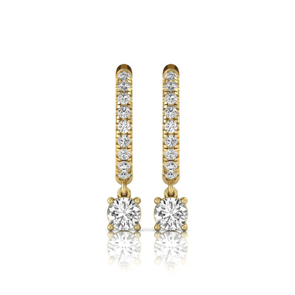Round cut lab grown diamond pavé drop huggie hoop earrings featuring a brilliant round solitaire diamond, sparkling pavé diamonds, hinged snap closure, and polished yellow gold finish.