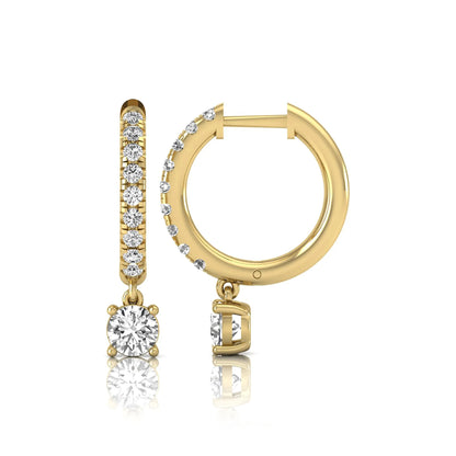 Round cut lab grown diamond pavé drop huggie hoop earrings featuring a brilliant round solitaire diamond, sparkling pavé diamonds, hinged snap closure, and polished yellow gold finish.
